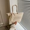 Este año de moda popular bolso de mano de seda simple 2023 primavera y verano Nuevo bolso de hombro tejido cesta de verduras bolso de mujer