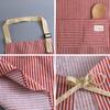 Delantal nuevo con rayas de color transpirable delgado para el hogar para hombres y mujeres cocina para cocinar impermeable mancha de aceite delantal de cintura fabricantes