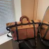 Primavera 2026 Nueva Bolsa de Mano para Viaje al Aire Libre Gran Capacidad Bolsa de Equipaje Viaje de Negocios Bolsa Portátil de Almacenamiento Bolsa Deportiva