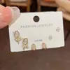 Moda de Lujo Ligero Sentido de Alta Gama Conjunto de Diamantes Tulipán Conjunto de Tres Piezas Traje Combinado Exquisito Dulce Para Todas las Ocasiones Joyería Pequeña para Orejas