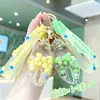 Llavero de cangrejo de pinza con arena movediza y aceite, lindo colgante de frijol de caramelo flotante para llave de coche, accesorio para mochila de estudiante