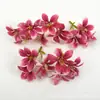 Nueva simulación de rocío tres ramas cabeza de flor de lirio DIY pared de flores de boda arreglo floral material de flor decorativa molde venta caliente