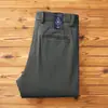 Colección otoño e invierno 2026: Pantalones largos de felpa, engrosados, cálidos, cepillados, de alta gama, versátiles, casual de negocios, de corte holgado, rectos, casuales para hombre