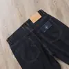 Calça Jeans Casual Masculina Europeia de Primavera/Verão Fina Azul-Preta Elástica Solta de Cintura Alta em Algodão Lyocell com Barra Reta