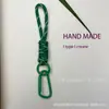 Cordón Popular para Teléfono Móvil Transfronterizo, Llavero Creativo Tejido a Mano para Equipaje, Regalos Creativos para Eventos, Venta al por Mayor de Fabricante