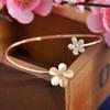 Versão coreana de pulseira de abertura de margarida fresca simples mercado pedra olho de gato flor de strass abertura pulseira fabricantes atacado