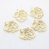 Versión coreana de colgante de flor hueca de aleación que combina con todo, accesorios de colgante, material para accesorios de joyería DIY, aretes