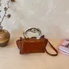Bolsos de diseñador únicos para mujer, nuevo estilo verano 2026, bolso cruzado dulce y personalizado, bolso de mano moderno y simple estilo coreano
