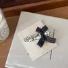 Pinza para el cabello de lujo de alta gama coreana, nicho, con lazo de pedrería, versátil, elegante, para flequillo, pasador, accesorio para el cabello