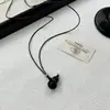 Collar con Cordón de Cuero Negro y Colgante de Calabaza Cepillada Sólida Moda Diseño de Nicho de Alta Gama Accesorio Versátil para el Uso Diario