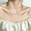 Colar Trevo de Quatro Folhas da Sorte Pérola Imitação Aço Titânio Banhado a Vácuo Novo Design de Verão Corrente de Clavícula de Luxo Leve Acessório para Mulheres