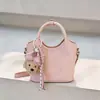 Bolsa de Mão Tendência de Nicho para Mulheres 2026 Novo Estilo de Verão Versátil Bolsa de Ombro Transversal Tipo Balde