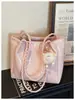 Venta al por mayor transfronteriza de modelos nuevos de bolsos tote simples y de moda para mujer, bolsos de hombro casuales de gran capacidad para el día a día, lindos bolsos de axila