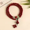 La fábrica Qingshan Lingyin suministra cuentas de madera de doble capa apiladas, pulsera de doble círculo, estilo retro artístico, nueva transmisión en vivo china, suministro directo