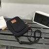 Bolso Pequeño Cuadrado Casual Deportivo para Mujer 2026 Nueva Moda Bolso Cruzado para Hombre Bolso Versátil para Teléfono Móvil de Estudiante Bolso de Hombro de Moda