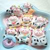 Accesorios de resina de vaca y cerdo Da Ka Meng, pegamento creativo para crema, horquilla para el pelo, taza de agua, funda de teléfono, colgante, decoración, lote