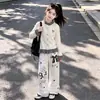 Conjunto Nuevo de Primavera y Otoño para Niñas 2026: Conjunto de cárdigan de punto a cuadros color block con ribete de encaje dulce y pantalones de pierna ancha