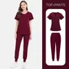 Conjunto de Uniforme Quirúrgico de Color Sólido de Dos Piezas con Cuello Abierto y Media Cremallera Uniforme de Trabajo Hospitalario Uniforme de Enfermera Multicolor Venta al por Mayor