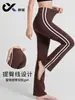 Pantalones de yoga de cintura alta, que realzan las caderas, ligeramente acampanados, con efecto adelgazante, con rayas verticales en contraste, diseñados para fitness y deportes, disponibles en tallas grandes para mujer, con pierna ligeramente acampanada
