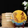 Atacado Chá Pu'er chá cozido 2022 bolo de chá cozido de pelo dourado chá yiwuzhengshan jinyiwu Yunnan bolo de chá de sete sementes