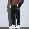 Pantalones Cálidos Estilo Japonés para Hombre Otoño e Invierno Forrados de Polar Engrosados Pantalones Deportivos Marca de Moda Estilo Americano High Street Sueltos Pierna Ancha Pantalones Casuales