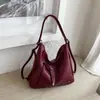 Bolso de hombro liso nuevo para principios de otoño de 2026 para el trabajo y los desplazamientos, bolso cruzado personalizado informal de gran capacidad a la moda