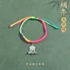 Pulseira de corda colorida zongzi do Festival do Barco-Dragão 2026 novo modelo pulseira trançada artesanal étnica infantil atacado corda vermelha