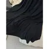 DestacadoYuran 26 Nueva Colección de Principios de Otoño: Conjunto de punto con top de manga larga asimétrico en modal y falda larga plisada