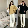 Ropa de maternidad otoño e invierno nuevo suéter de cuello de color block holgado que cubre el vientre cúrcuma negro estilo perezoso top de punto pieza única