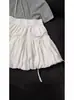 25 Saia de Design Exclusivo com Laço para Mulheres no Verão, Pequena de Cintura Alta com Efeito Emagrecedor, Saia Curta Rodada Linha A
