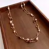 Collar Colgante Oval Hueco Pintado en Spray Estilo Minimalista, Cadena para Suéter Moderna y Única, Accesorio Versátil de Nicho para Mujeres con un Toque de Lujo