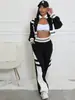 Td2789 Ropa Femenina Transfronteriza Europea y Americana Otoño e Invierno Nuevo Conjunto de Dos Piezas con Top de Cuello Alto con Cremallera y Pantalones Largos de Bloques de Color para Mujer