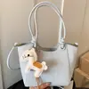 Bolsos de diseño de nicho transfronterizos para mujer 2026 nueva moda versátil bolso cubo para mujer bolso de hombro único bandolera de moda