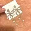 Pendientes Largos con Borla de Perlas y Lazo Estilo Socialité, Pendientes Sencillos y Sofisticados de Zirconita