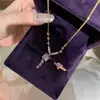 Libro Rojo Pequeño con Nueve Fuego Púrpura Diamante Púrpura Super Hada Collar Diseño Femenino Sentido Hada Zixia Traje Anillo Cadena de Lana