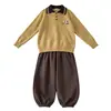Ropa para niños: Suéter de punto de manga larga con cuello polo, nueva colección de otoño 2026, pantalones de algodón holgados, conjunto de dos piezas de pantalones casuales versátiles