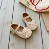 Zapatos de piel para niños 2026 primavera y otoño nuevos estilo coreano versátiles con lazo zapatos para bebés para niñas con suelas suaves y ribete de encaje