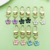 Colgantes de Flor de Cerezo de Cinco Pétalos de Colores de Venta Caliente Transfronteriza Accesorios para Llaveros de Bolsas de Regalo Navideños Directo del Fabricante