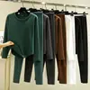 Novo conjunto de roupa íntima térmica feminina para outono e inverno: conjunto de duas peças: camiseta de manga longa com gola redonda e base em formato de arco, e calça longa justa e elástica