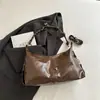 Bolsa de Ombro/Transversal Feminina Cor Sólida Outono Nicho Moda Nova Popular Bolsa Tote para o Dia a Dia 2026