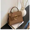 Bolsos de Mujer de Moda de Este Año 2026 Primavera y Otoño Nuevo Bolso Kelly para el Trabajo Pequeño Cuadrado Elegante de Hombro Cruzado