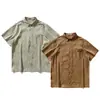Camisa de manga corta con textura de rayas verticales para hombre, corte holgado, ambiente veraniego, marca de moda, color liso, camisa casual con cuello versátil