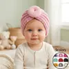 Nuevo gorro infantil europeo y americano, gorro de lana tipo donut de color liso para bebé, gorro cálido para otoño e invierno.