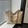 Bolsa Pequena de Palha Popular de Verão Feminina 2025 Nova Casual Versátil para Feriado Bolsa Transversal Explosiva Portátil Bolsa Tote