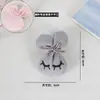 Nuevo Broche de Ropa de Conejo Lindo Estilo Japonés Relleno de Algodón Accesorios para Ropa Infantil Bolsas Colgantes para Teléfono Móvil Accesorios de Celebridades de Internet Venta al por Mayor