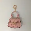 Nuevo Colgante Colgante de Cuero con Monograma Llavero Bolsa de Almacenamiento Estuche para Auriculares Billetera Adorno Colgante Pequeño Lindo Mini Colgante