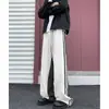 Pantalones deportivos de chándal con estampado de leopardo patchwork hip-hop americano para hombre y mujer, marca de moda de corte holgado, pantalones casuales de rayas fluidas para hip-hop y baile callejero
