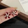 Aretes de botón de flor de circonita de lujo ligero estilo francés 2023 otoño e invierno Nuevo Nicho moda de alto sentido aretes de joyería para todo