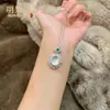 Colgante de huevo de paloma de jade de agua helada natural de alta calidad, nicho de lujo ligero, fresco y sofisticado, colgante de ágata con diamantes completos