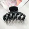 Popular Pinza para el Cabello Grande con Forma de Calabaza de Colores Abs de Amazon para Peinar el Cabello con Mucho Volumen y Crear un Chongo en la Parte Posterior de la Cabeza
